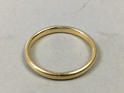 Lot 377 - A GOLD CAMEO DRESS RING, ALONG WITH AN EIGHTEEN CARAT GOLD WEDDING RING