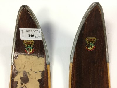 Lot 246 - A PAIR OF VINTAGE SKIS AND SKI BOOTS