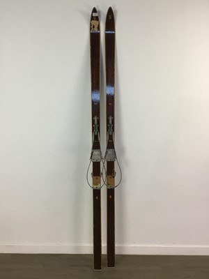 Lot 246 - A PAIR OF VINTAGE SKIS AND SKI BOOTS