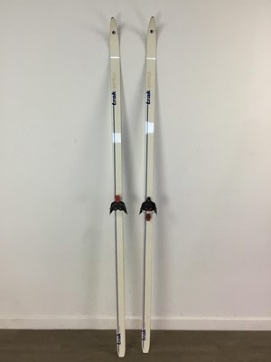 Lot 246 - A PAIR OF VINTAGE SKIS AND SKI BOOTS
