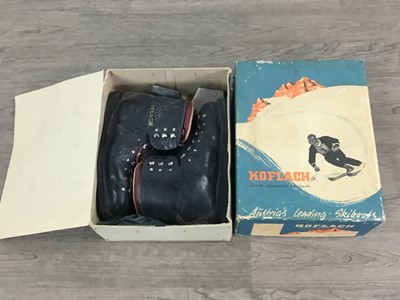 Lot 246 - A PAIR OF VINTAGE SKIS AND SKI BOOTS