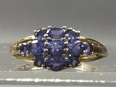 Lot 409 - A TANZANITE AND DIAMOND RING