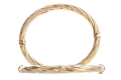 Lot 433 - A PAIR OF NINE CARAT GOLD BANGLES