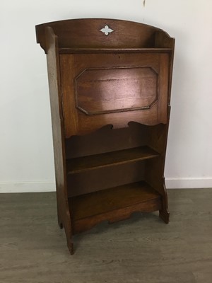 Lot 449 - AN EARLY 20TH CENTURY OAK SLIM BUREAU BOOKCASE