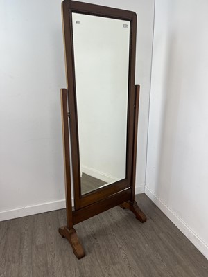 Lot 579 - A WALNUT CHEVAL MIRROR