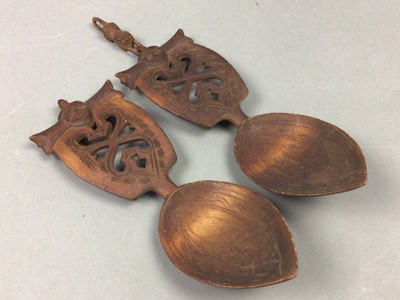 Lot 540 - A PAIR OF WOOD MARRIAGE SPOONS