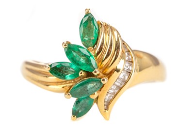 Lot 464 - A EMERALD AND DIAMOND CLUSTER RING