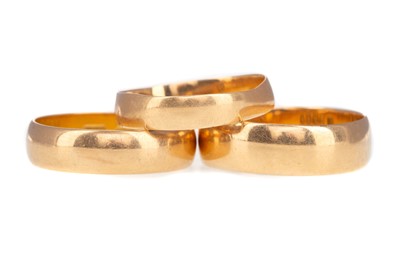 Lot 467 - THREE EIGHTEEN CARAT GOLD WEDDING RINGS