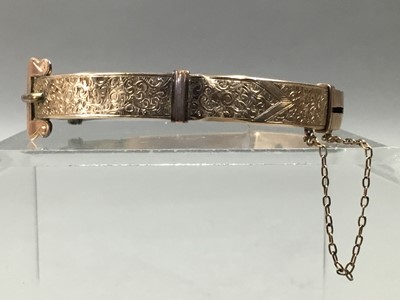 Lot 13 - A  VICTORIAN NINE CARAT GOLD BUCKLE BANGLE