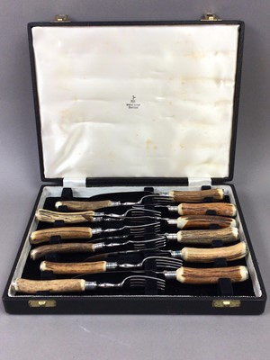 Lot 628 - A SET OF STEAK KNIVES AND FORKS