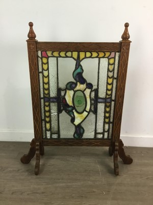 Lot 317 - A STAINED AND LEADED GLASS INSET FIRESCREEN