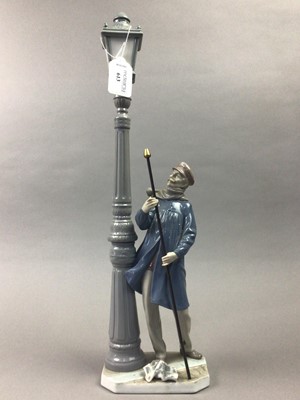 Lot 613 - A LLADRO FIGURE OF A LAMPLIGHTER