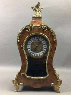 Lot 623 - A LAURIS BURR WALNUT MANTEL CLOCK