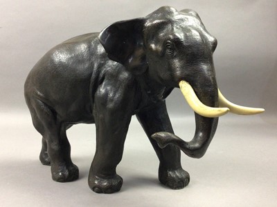 Lot 621 - A RESIN MODEL OF AN ELEPHANT