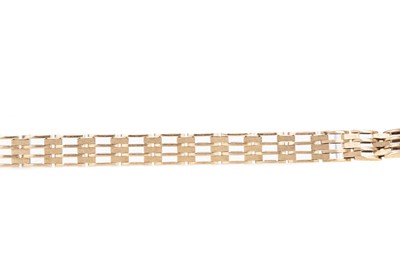 Lot 488 - A NINE CARAT GOLD GATELINK BRACELET