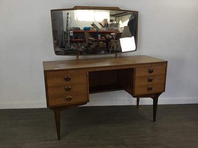 Lot 741 - A MID CENTURY TEAK CHEST OF DRAWERS AND A DRESSING TABLE