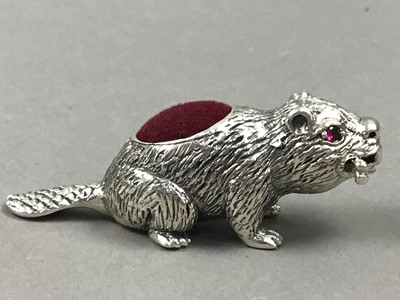 Lot 767 - A SILVER BEAVER PIN CUSHION