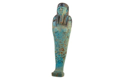 Lot 73 - AN ANCIENT EGYPTIAN SAITE PERIOD FAIENCE USHABTI