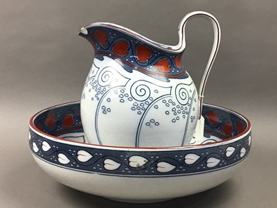 Lot 19 - A ROYAL DOULTON SEYMOUR PATTERN WASH BASIN AND EWER