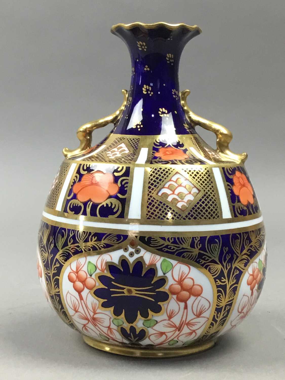 Lot 245 - A ROYAL CROWN DERBY VASE AND A ROYAL CROWN DERBY CUP AND SAUCER