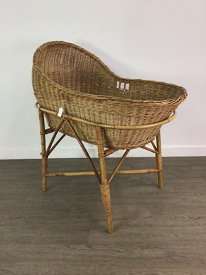 Lot 460A - A WICKER CRIB ON STAND