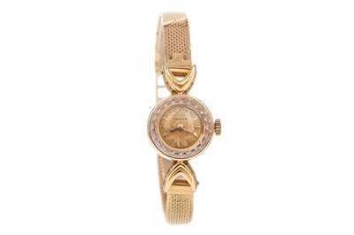 Lot 834 - A LADY'S OMEGA EIGHTEEN CARAT GOLD MANUAL WIND WRIST WATCH