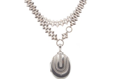 Lot 503 - A SILVER LOCKET