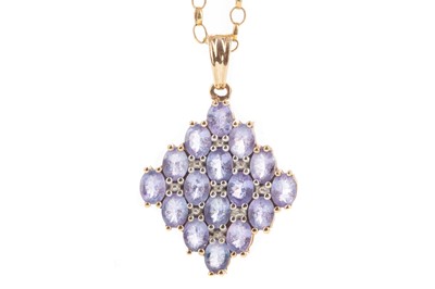 Lot 507 - A TANZANITE PENDANT