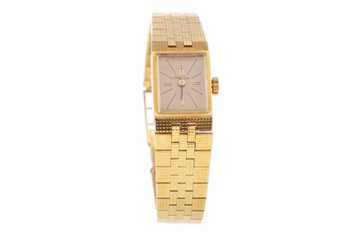 Lot 841 - A LADY'S OMEGA  EIGHTEEN CARAT GOLD MANUAL WIND WRIST WATCH