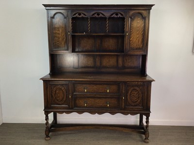 Lot 130 - A WYLIE & LOCHHEAD OAK DRESSER