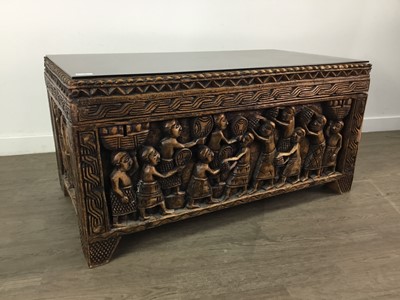 Lot 129 - A EASTERN CARVED HARDWOOD BLANKET CHEST