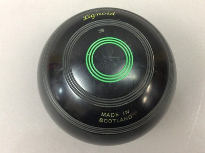 Lot 55 - A SET OF FOUR GRASS BOWLS