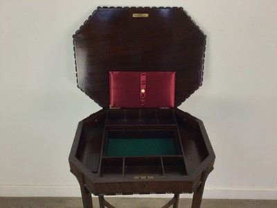 Lot 76 - A MAHOGANY FRETWORK OCTAGONAL WORK TABLE