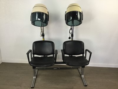 Lot 204 - A PAIR OF HAIRDRESSERS CHAIRS