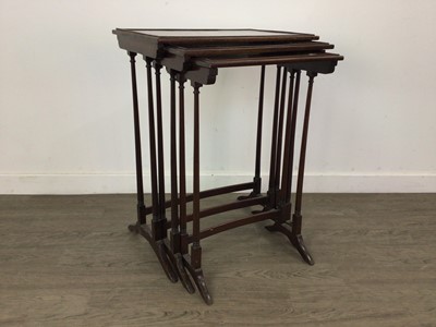 Lot 210 - A NEST OF THREE MAHOGANY REGENCY STYLE TABLES