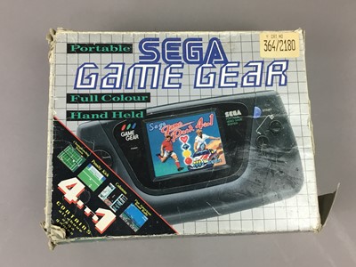 Lot 1003 - A SEGA GAME GEAR, TV TUNER PACK AND 18 GAMES