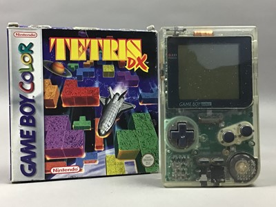 Lot 1013 - A NINTENDO ORIGINAL GAME BOY, POCKET (CLEAR) AND APPROXIMATELY 75 GAMES