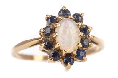 Lot 545 - A SAPPHIRE AND OPAL RING ALONG WITH A STRING OF PEARLS