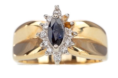 Lot 556 - A SAPPHIRE AND DIAMOND CLUSTER RING