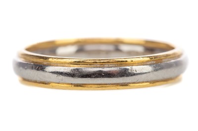 Lot 567 - A PLATINUM AND GOLD WEDDING BAND