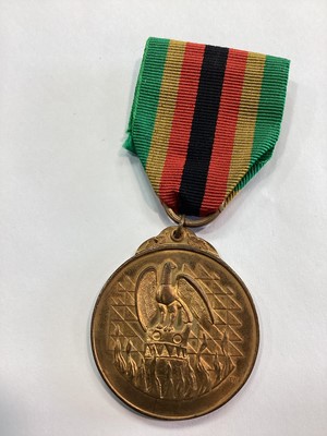Lot 73 - AN ELIZABETH II 1980 RHODESIA MEDAL AND ZIMBABWE INDEPENDENCE MEDAL