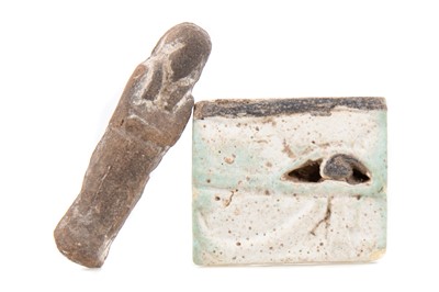 Lot 115 - AN ANCIENT EGYPTIAN EYE OF HORUS FAIENCE AMULET AND MINIATURE USHABTI