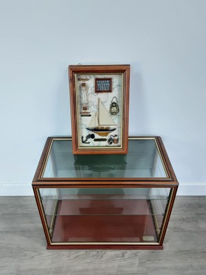 Lot 242 - A MAHOGANY DISPLAY CABINET AND A DIORAMA OF A SHIP