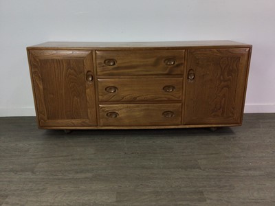 Lot 249 - AN ERCOL WINDSOR ELM SIDEBOARD