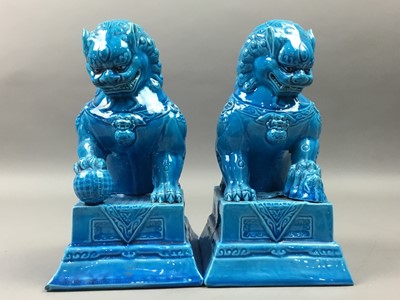 Lot 392 - A PAIR OF MODERN CHINESE TURQUOISE GLAZED BUDDHISTIC LIONS AND TWO CAT MODELS