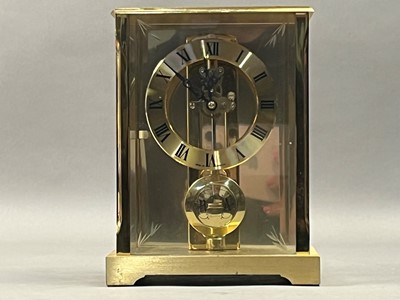Lot 380 - A BRASS CASED MANTEL CLOCK