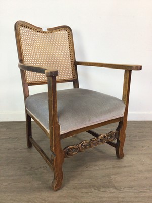 Lot 255 - A CANE BACK ARMCHAIR