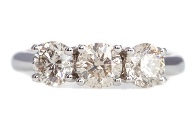 Lot 430 - A DIAMOND THREE STONE RING