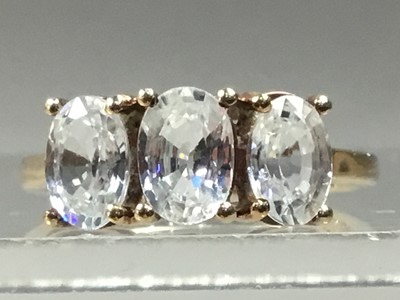 Lot 458 - A COLLECTION OF GEM SET THREE STONE RINGS