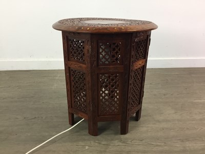 Lot 416 - A CARVED HARDWOOD OCCASIONAL TABLE